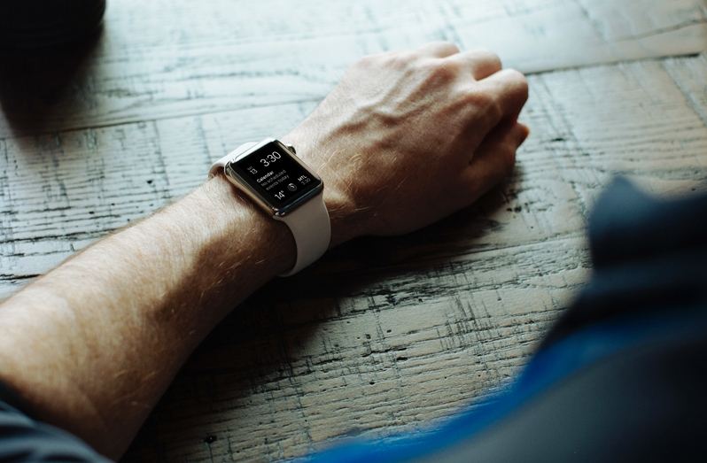 A man's hand with watch on his wrist